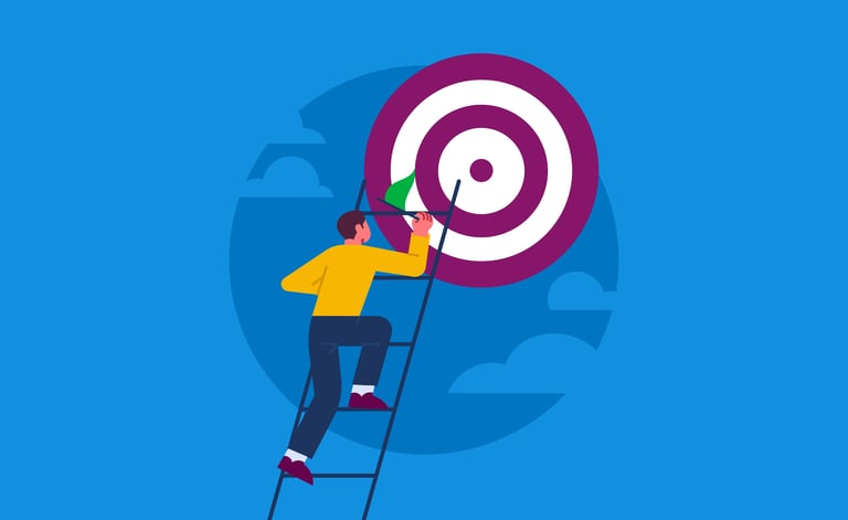man on ladder painting a bullseye